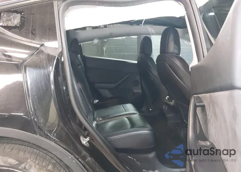 2022 Tesla Model Y Long Range Dual Motor All-Wheel Drive z USA, uszkodzony, nr VIN 7SAYGDEE4NF320766